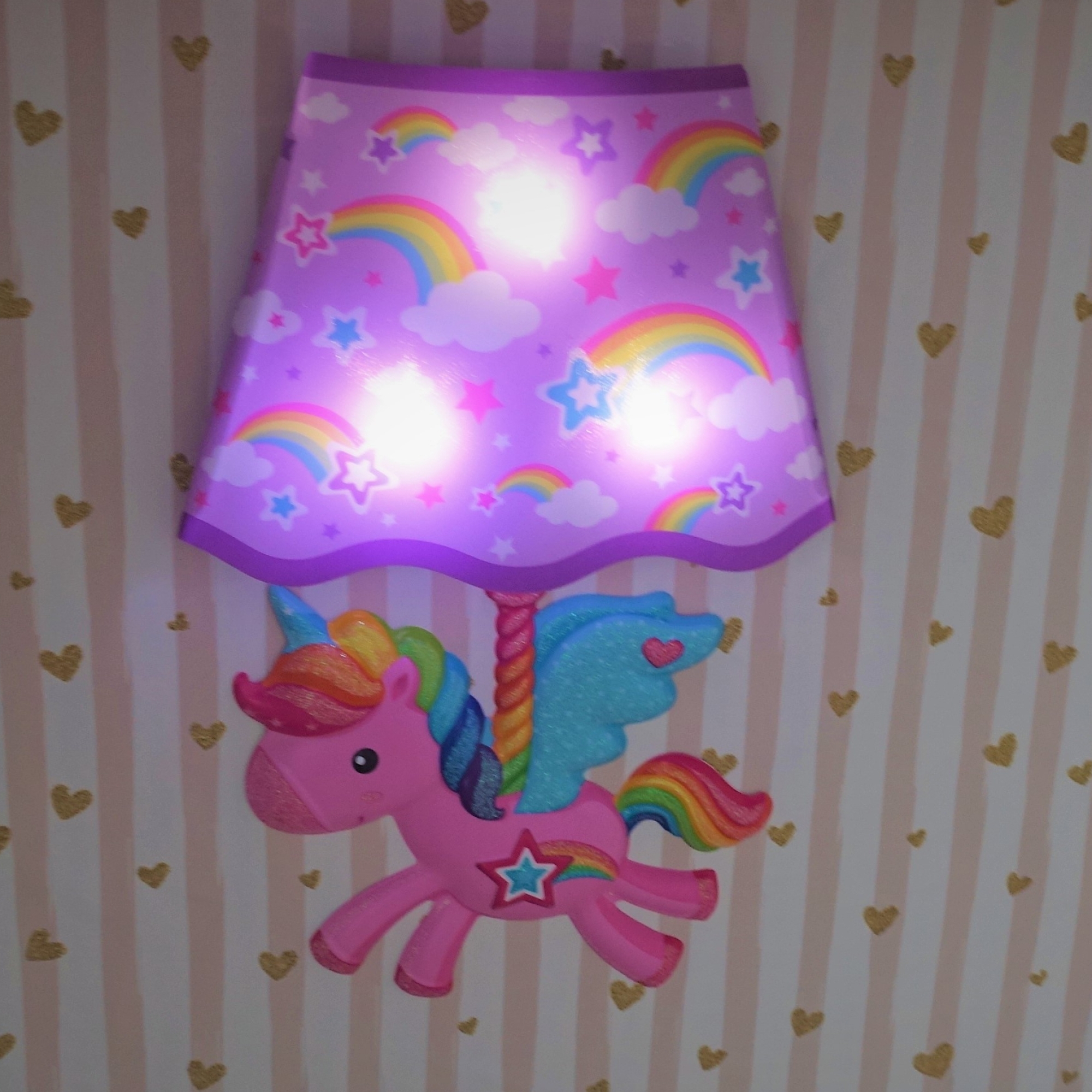 A purple unicorn lamp to decorate the cardboard playhouse