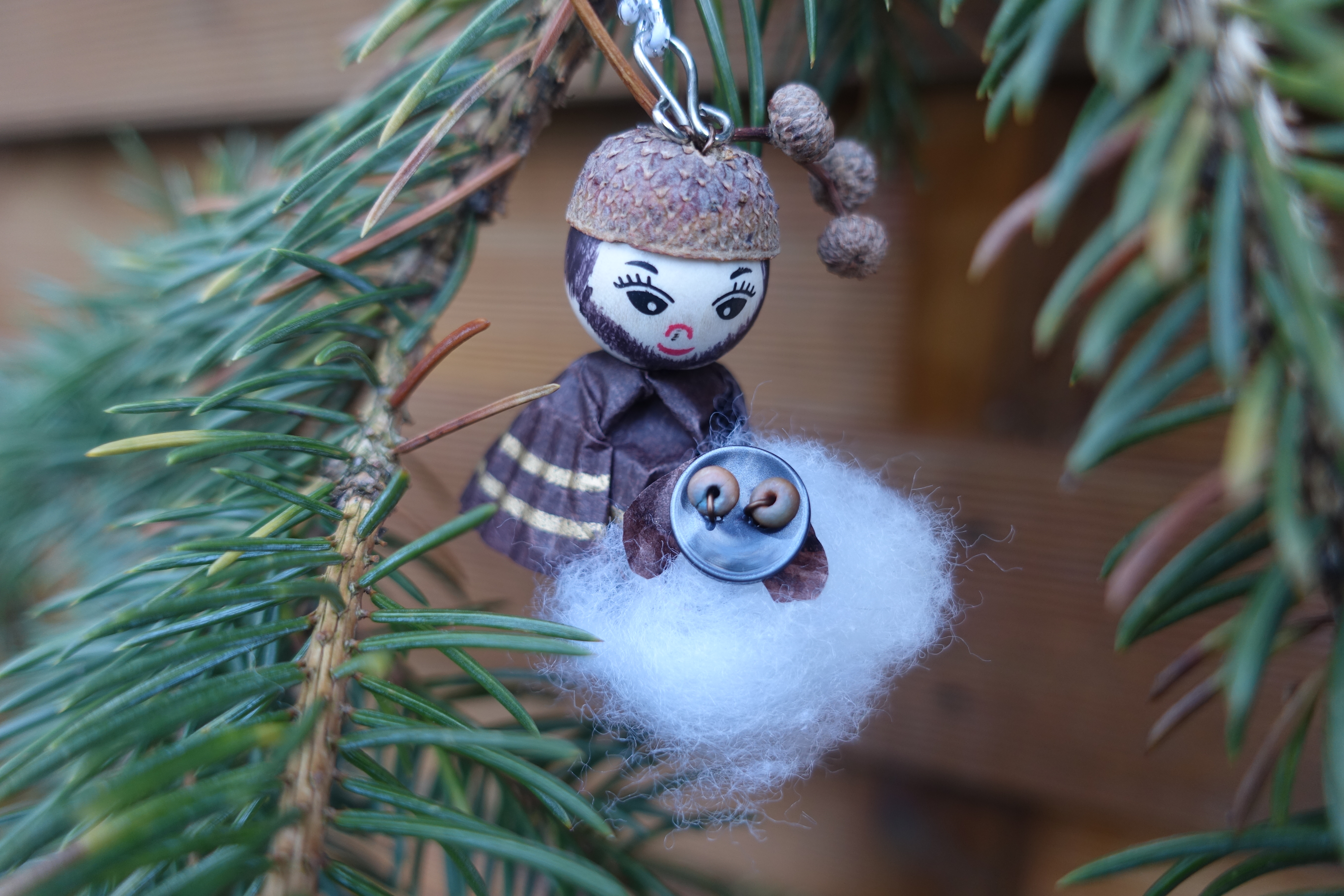 Shepherd ornament with a sheep